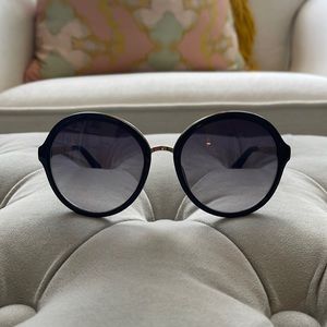 Black, oversized, round Kate Spade sunglasses